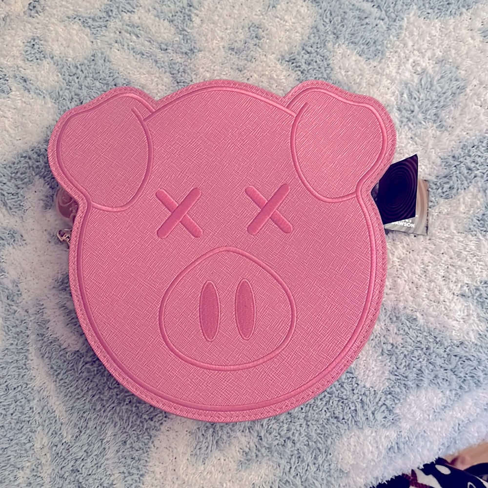 Brand New with tags. NEVER USED. Plastic protector on charm still attached.